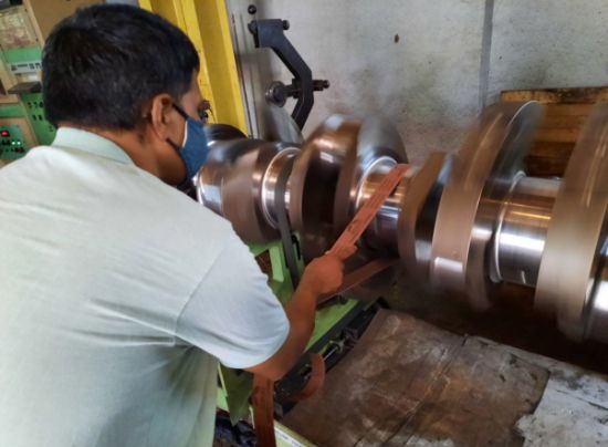 Polishing of crankshaft with 400 grit sandpaper